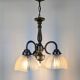 Antique Art Deco chandelier with 3 arms in patinated metal and ribbed glass.