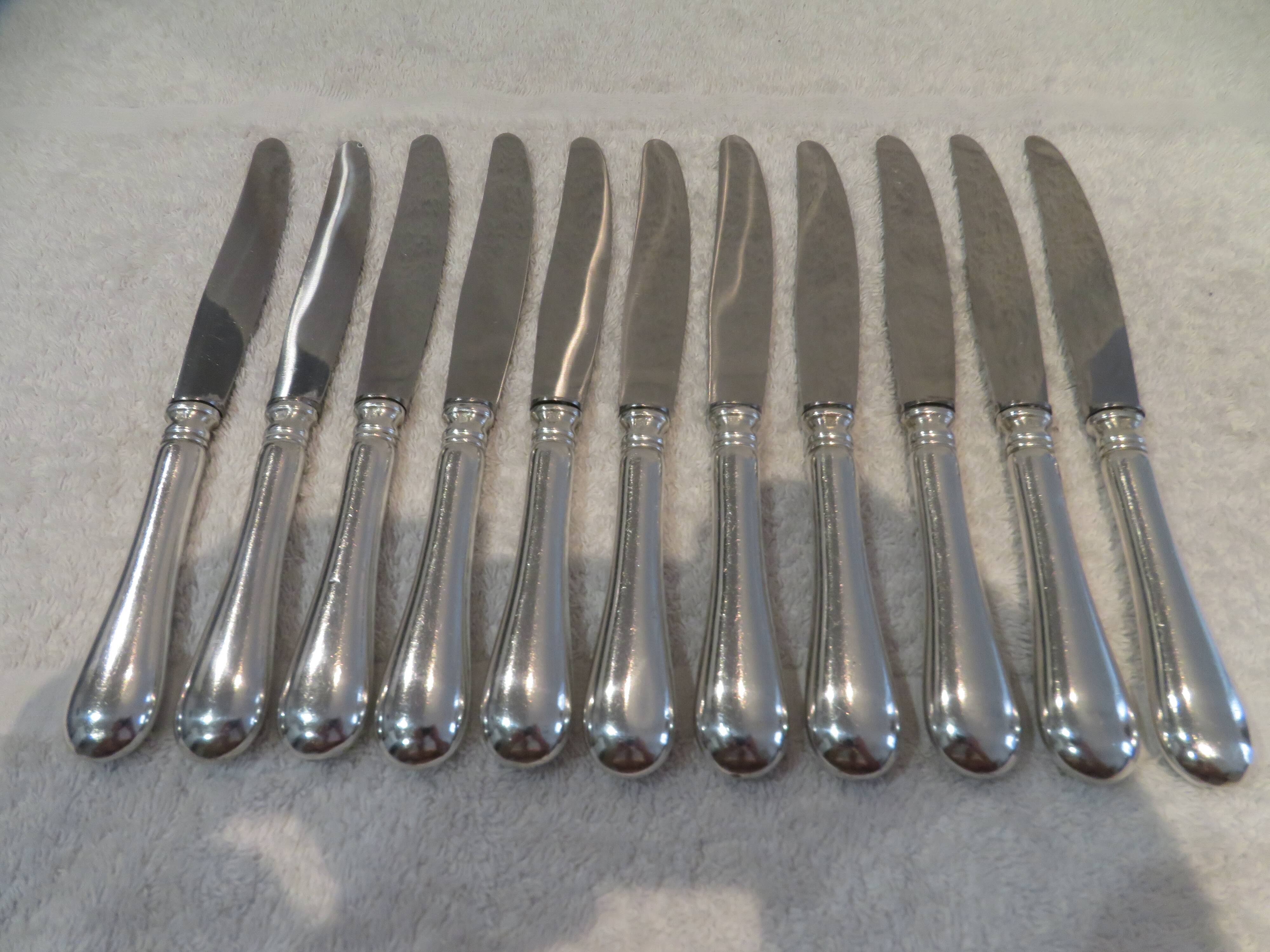 11 silver-plated dessert knives, Ercuis goldsmith, Roses model, Louis XVI style