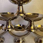 Set of 6 stainless steel ice cream bowls by Guy Degrenne with matching spoons.