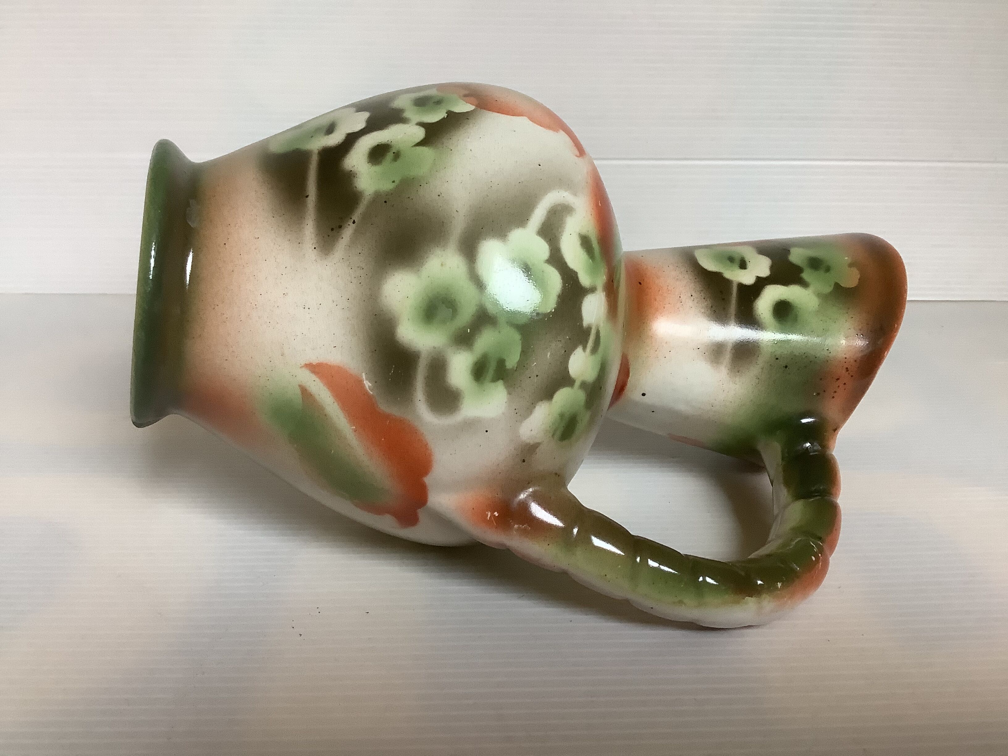 Old vase jug shape green and orange flowers