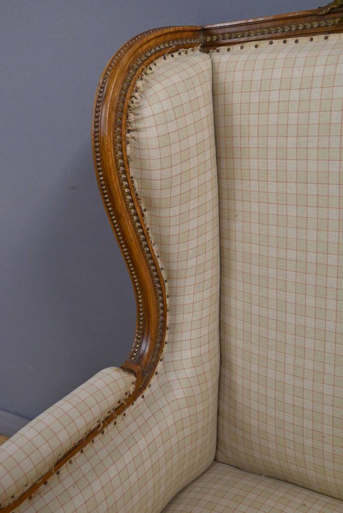 Wingback armchair in walnut, Louis XVI style – late 19th century