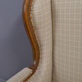 Wingback armchair in walnut, Louis XVI style – late 19th century