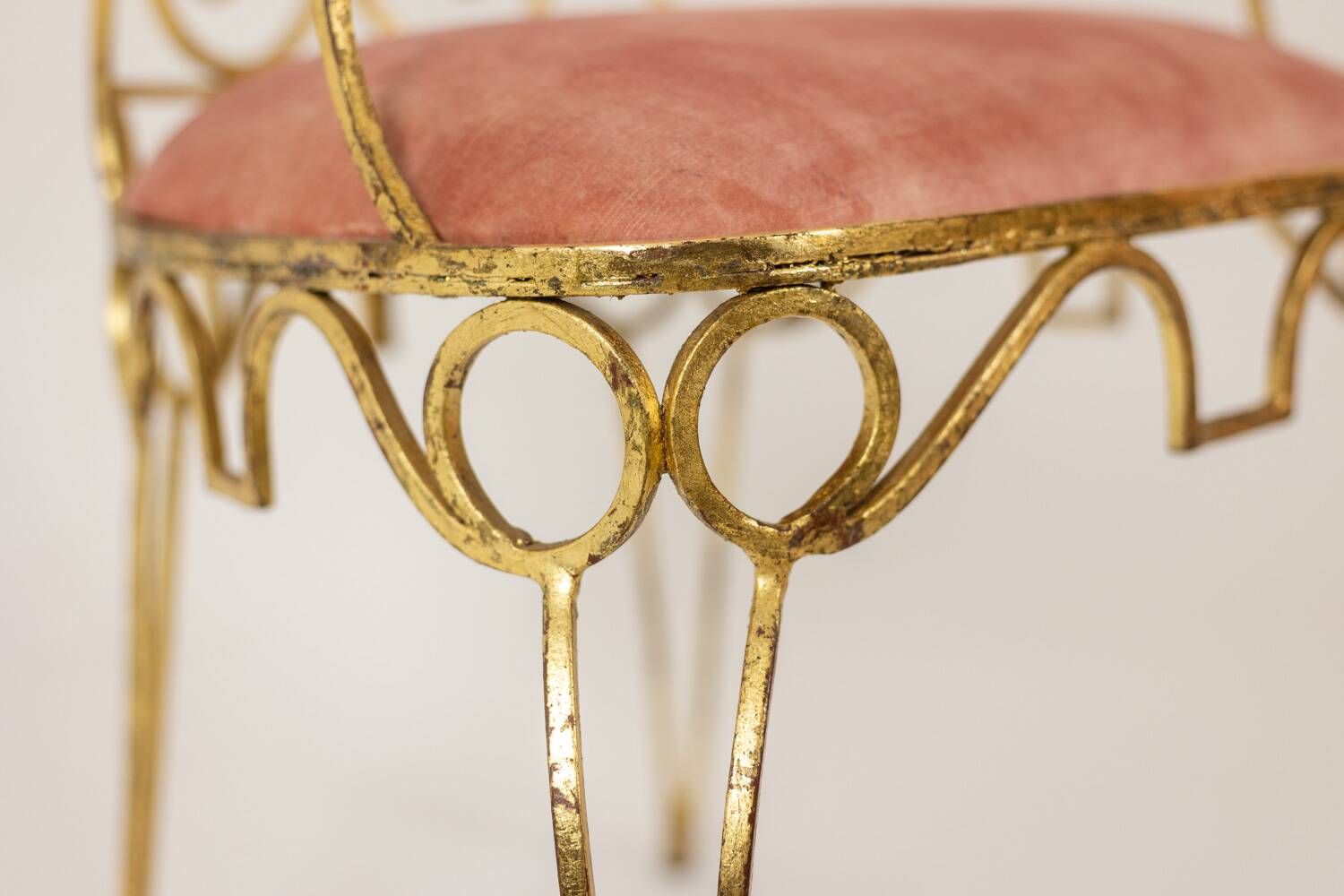 Pair of wrought iron and gilded armchairs, circa 1990