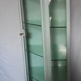 Painted metal ophthalmologist's corner display case, early 20th century