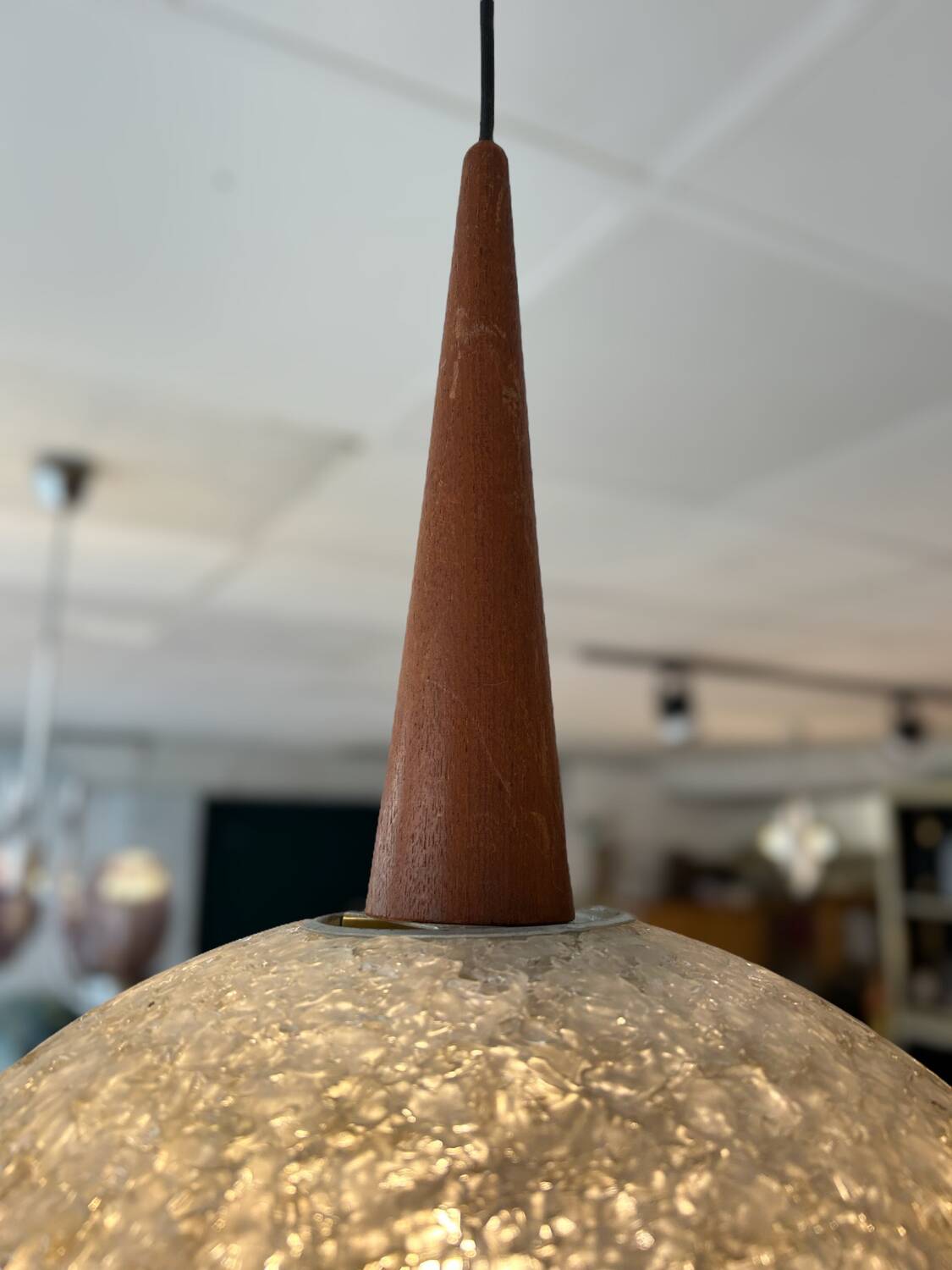 Resin and teak ball pendant light
