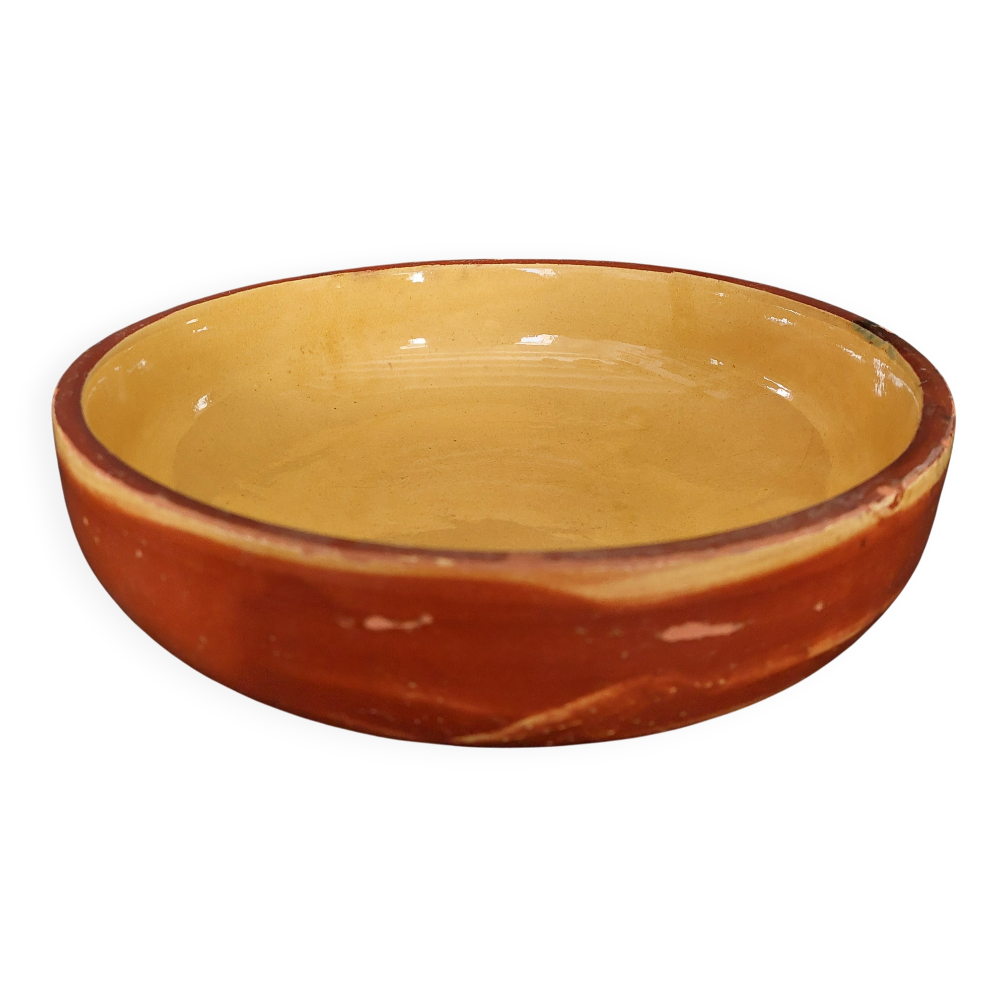 Glazed terracotta shallow dish from the 20th century.