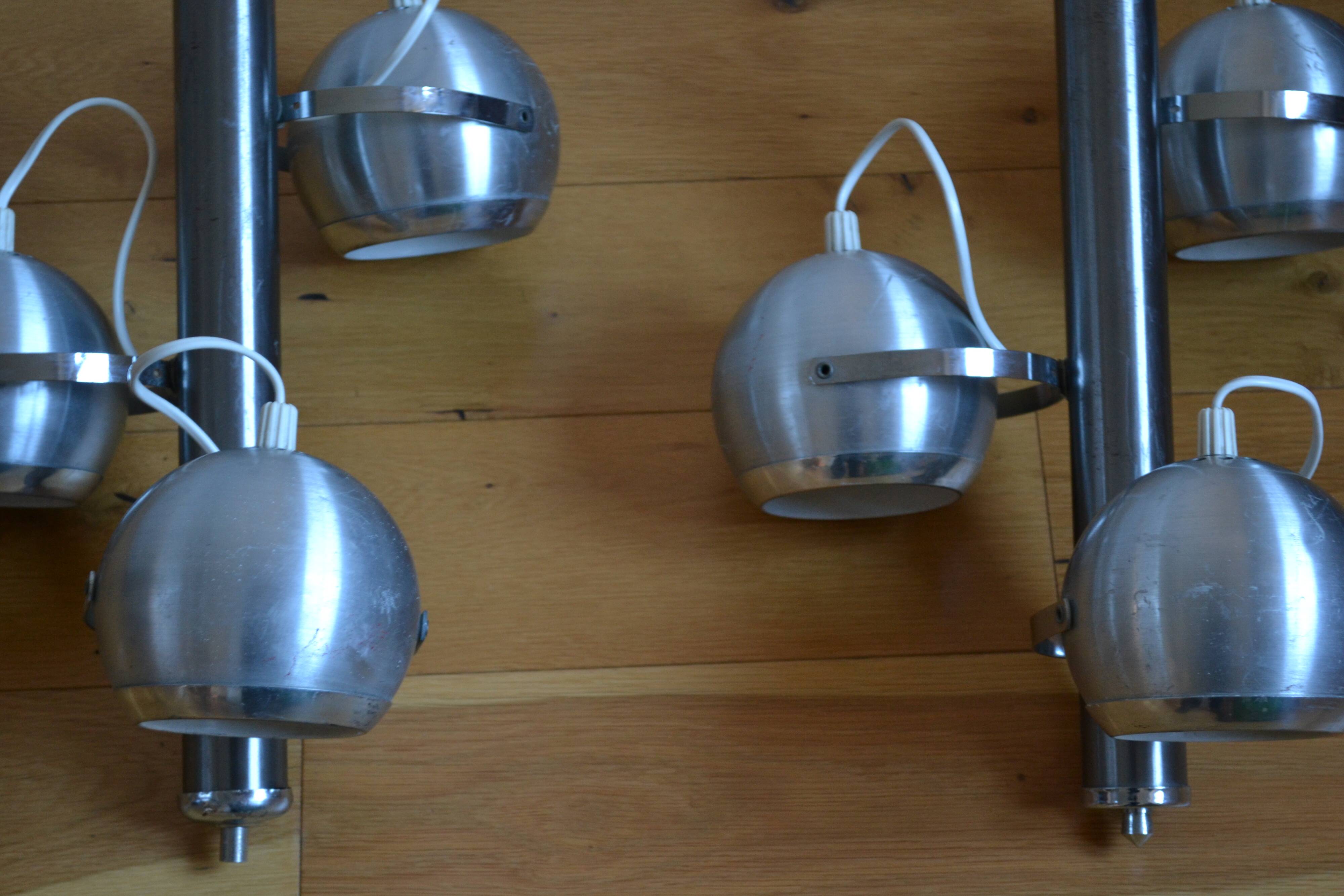 Pair of 70s space age eye ball chandeliers in brushed aluminum