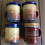 4 cups of the brand Staffordshire in porcelain. Two different colors.