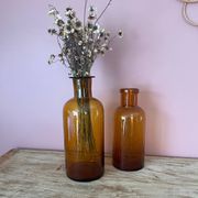 Amber glass vase bottle