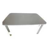 Glossy white table for dining room with white metal legs, in very good condition.