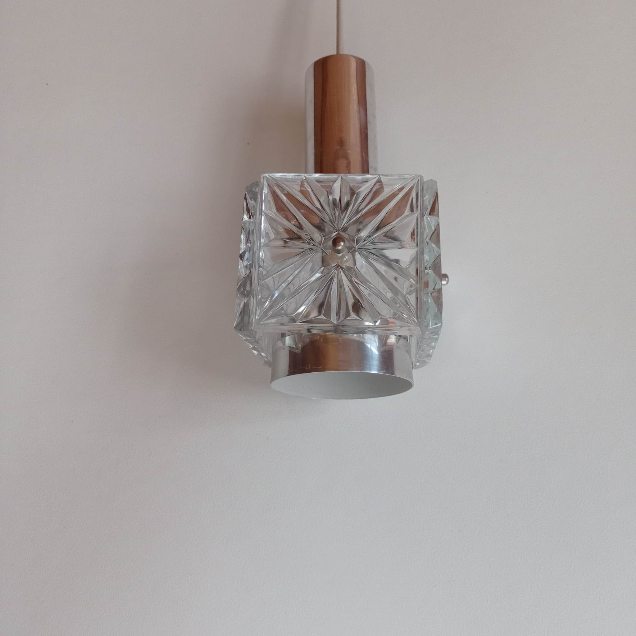 A set of four Kinkeldey pendant lamps from the 70