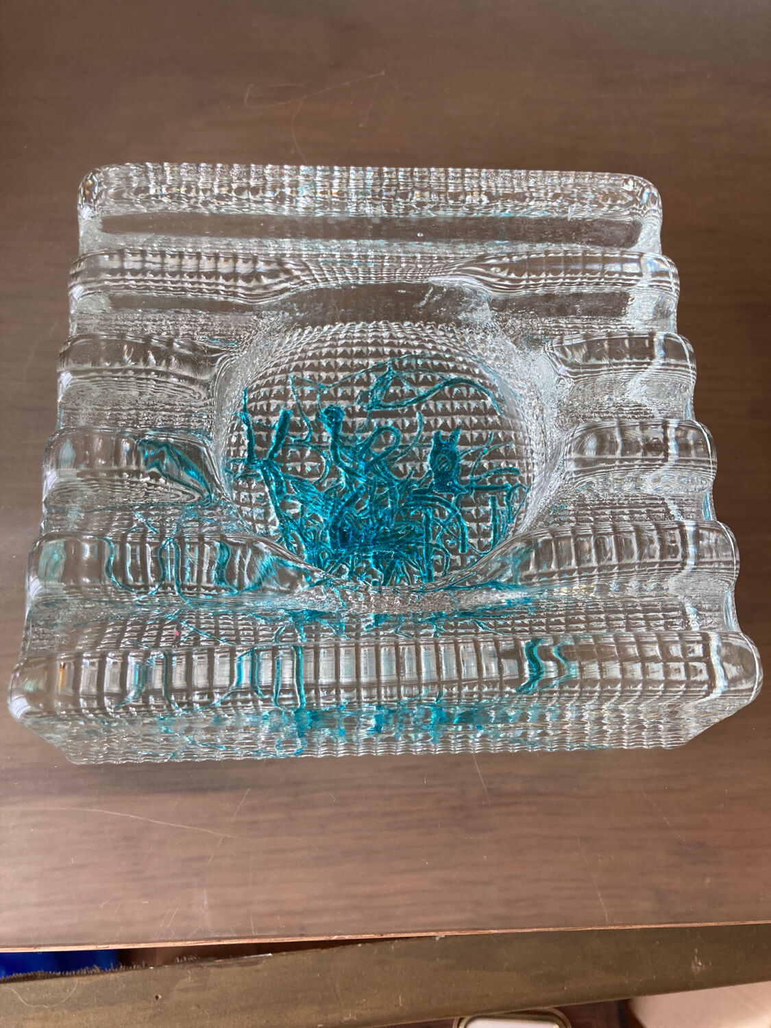 Empty pocket or large glass ashtray