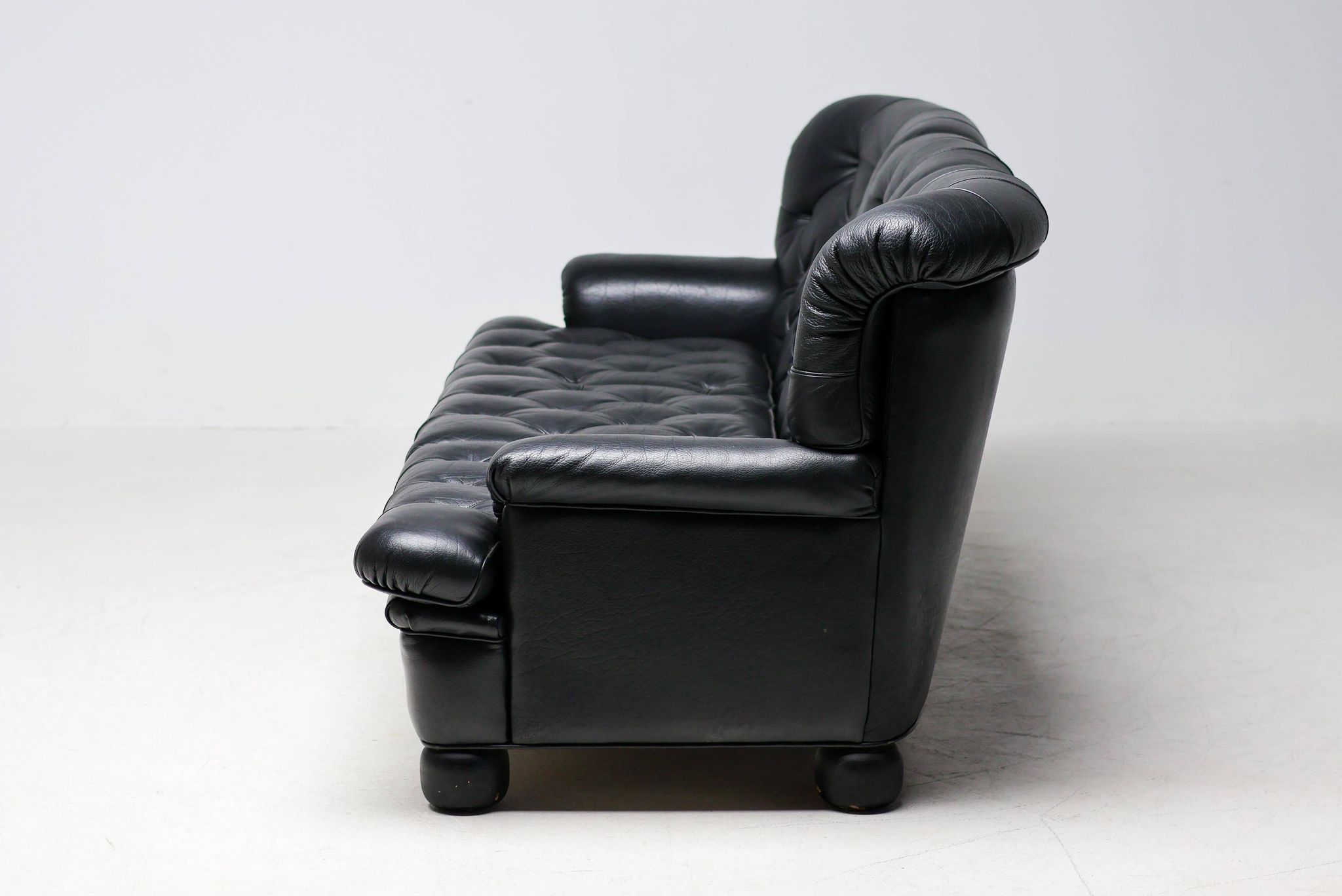 Three-seater sofa "Jupiter" in black leather by Arne Norell, Sweden, 1960.