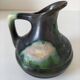 Ceramic pitcher Thulin Belgium flamed green black enamel