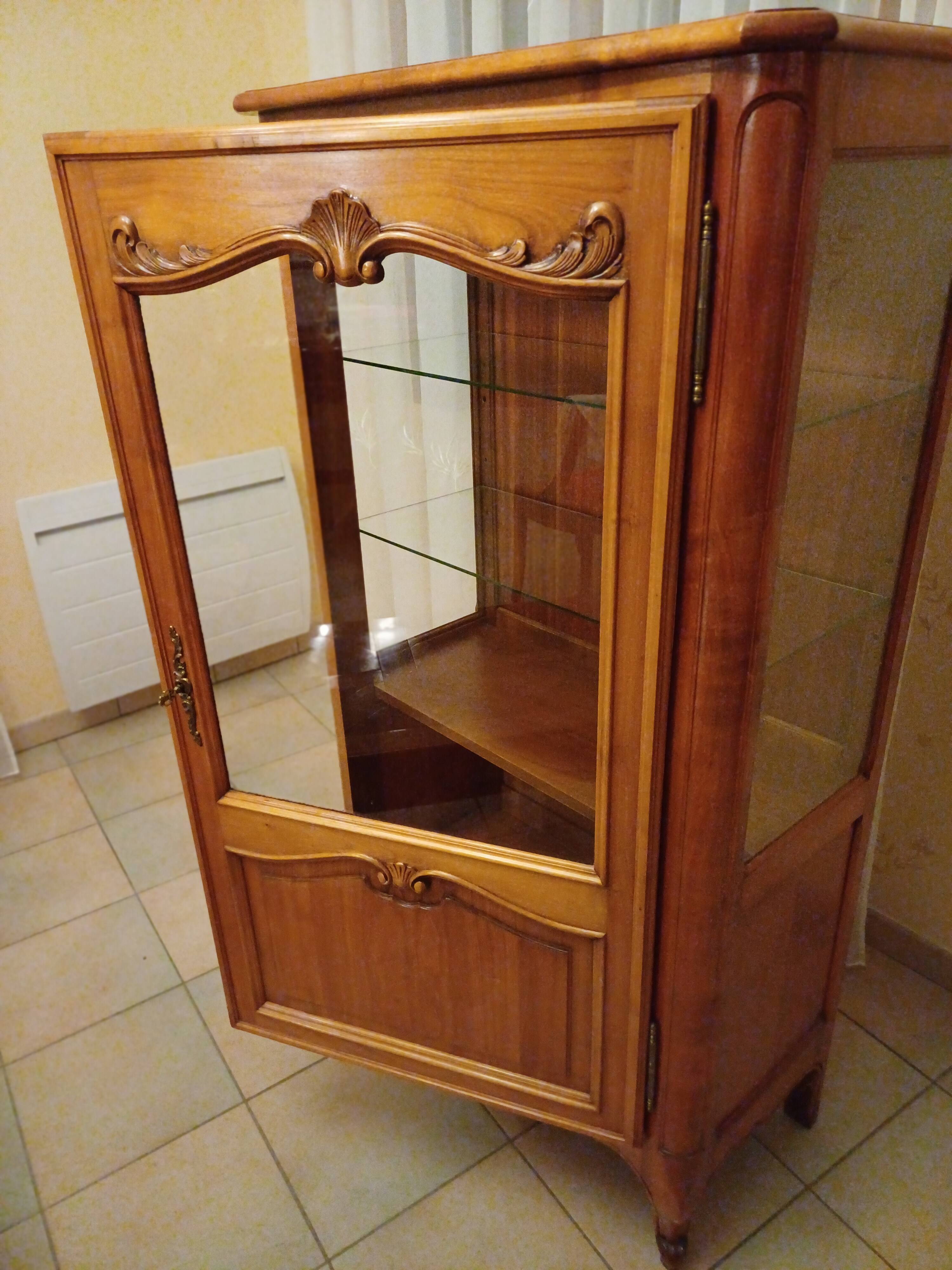Solid wood display cabinet.