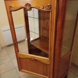 Solid wood display cabinet.