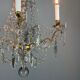 Bronze chandelier with cut crystal pendants, circa 1800.