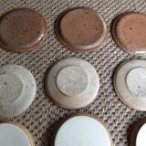 Set of 9 stoneware plates