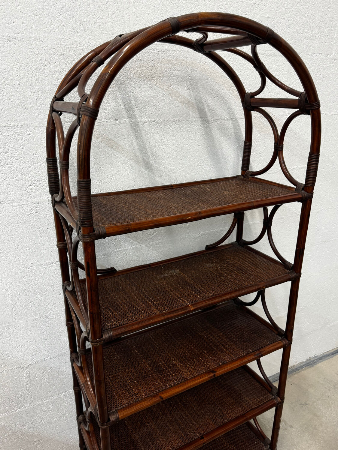 Dark rattan and bamboo bookshelf shelf