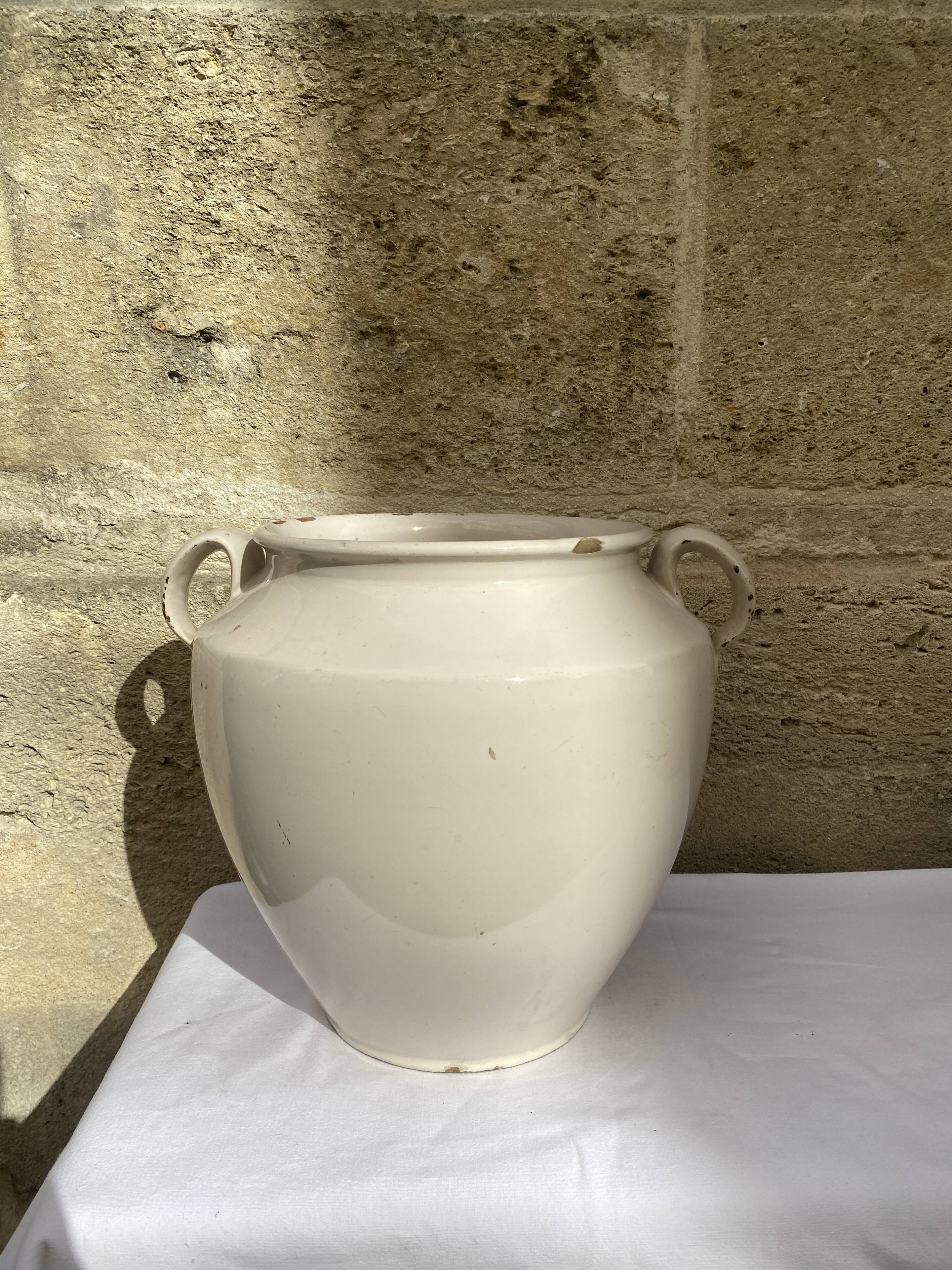 Enamelled terracotta pot