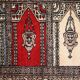 Tapis vintage fait main Bukhara de prière en laine rouge (45cm x 101cm)
