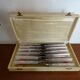 12 knives style Art Deco stainless steel in case