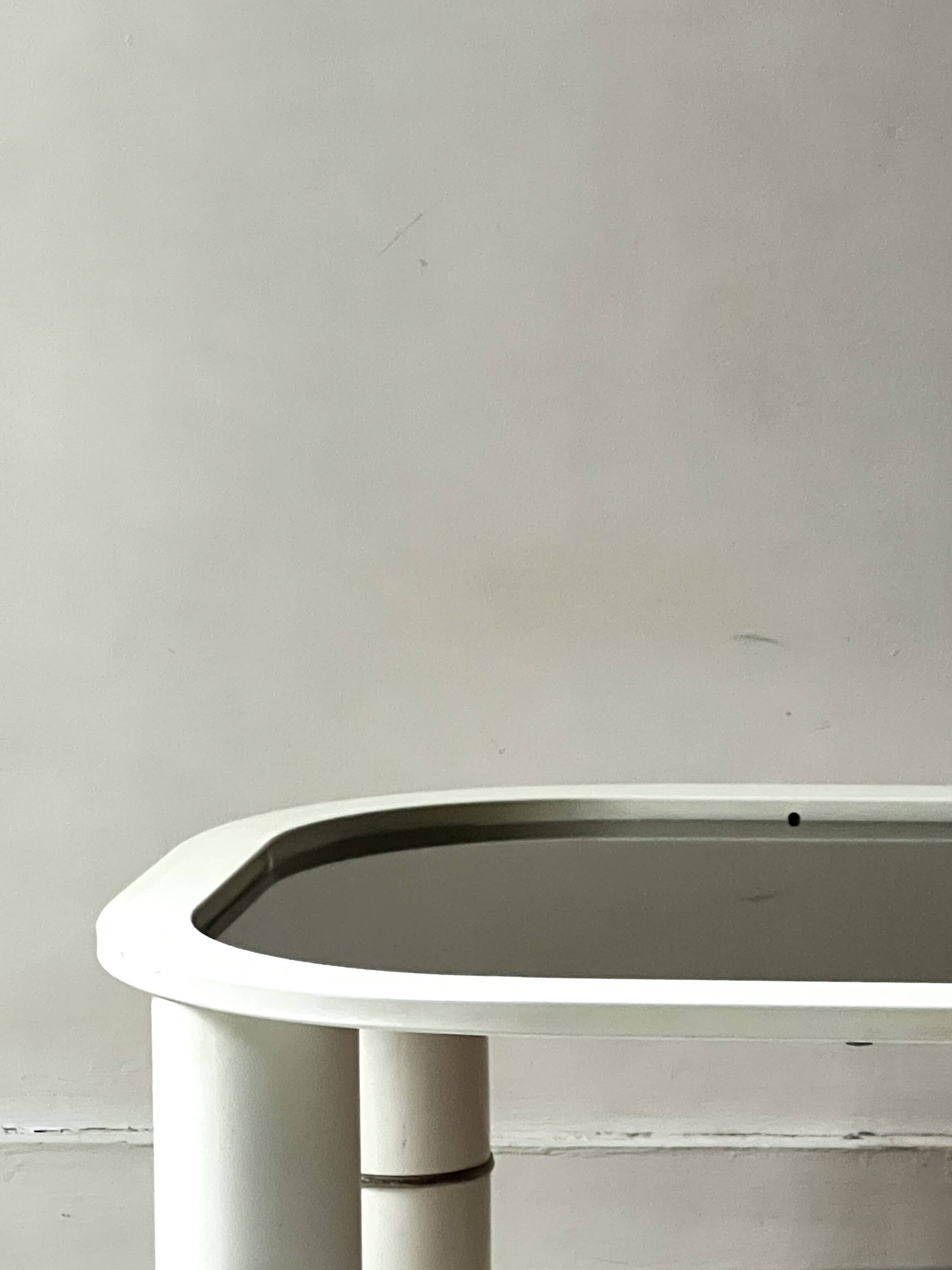 Rectangular coffee table with rounded edges, lacquered metal, brass & smoked mirror, 70s design.