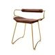 Organic bar stool with a vintage brass backrest and brown leather.