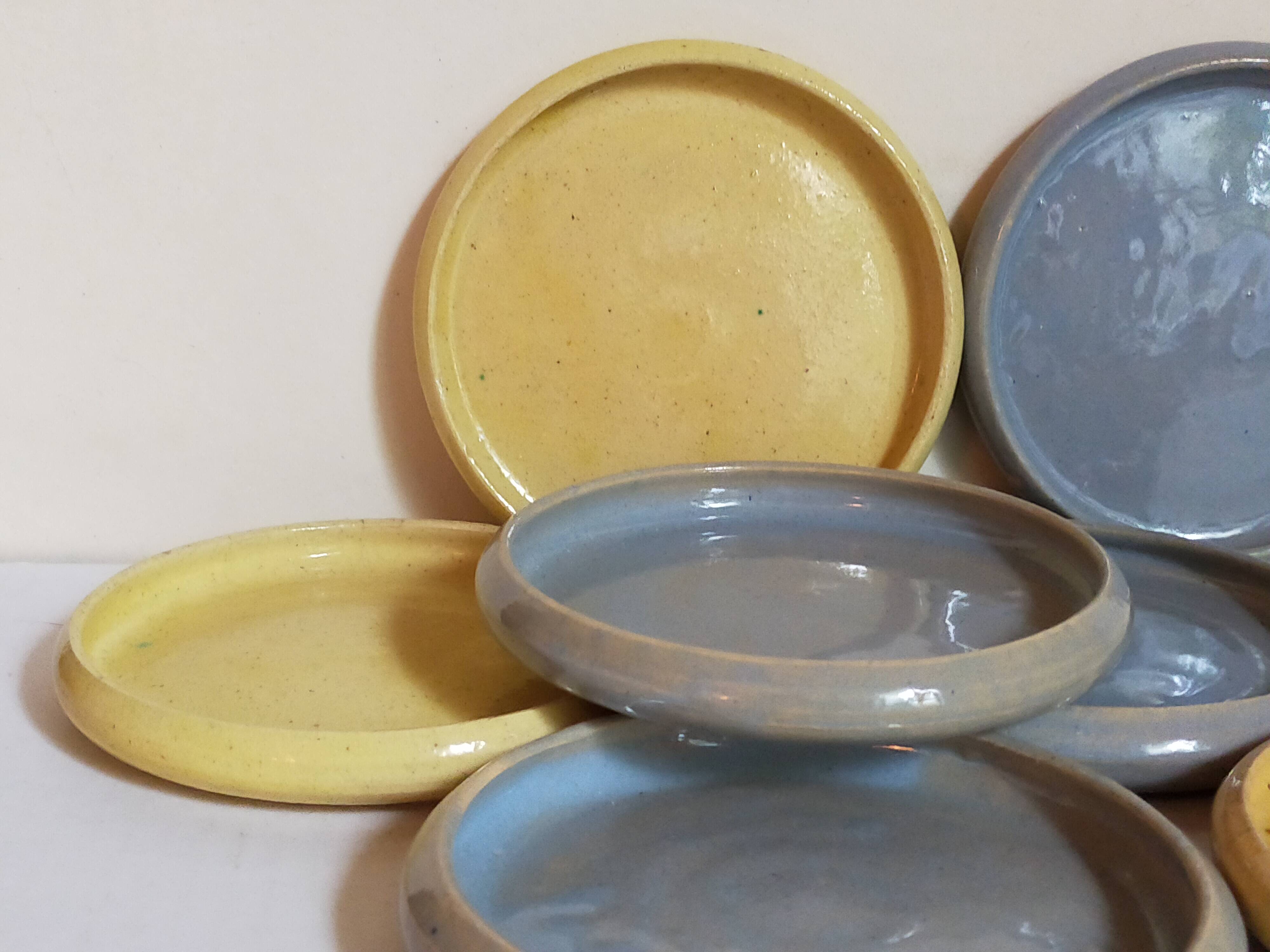 Seven vintage potter's sweet treat plates