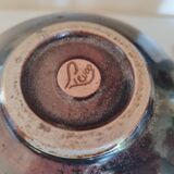 Stoneware pitcher by Matthieu Liévois in shades of red