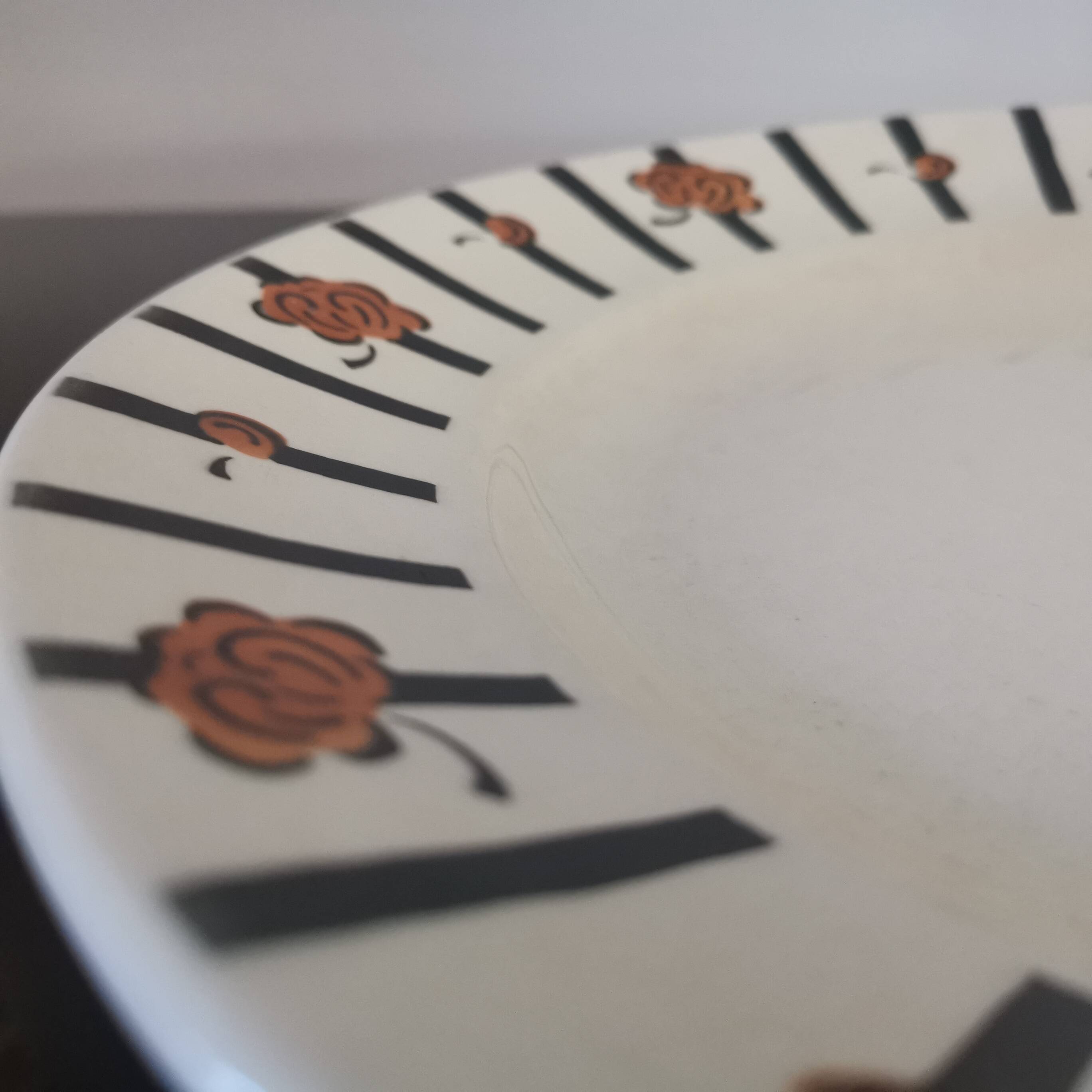 Old Round Serving Dish “Badonviller” black and orange