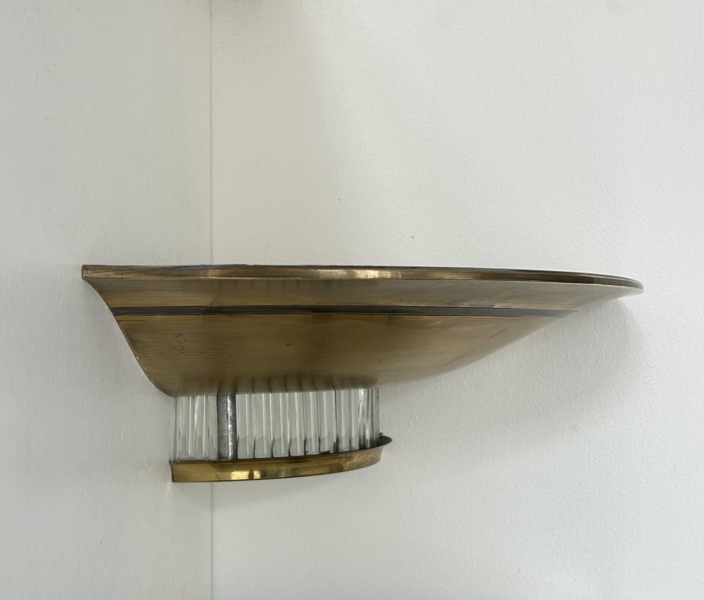 Pair of Art Deco corner sconces, brass and glass, France 1930