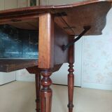 Pair of Louis Philippe style walnut bedside tables / work tables with flap