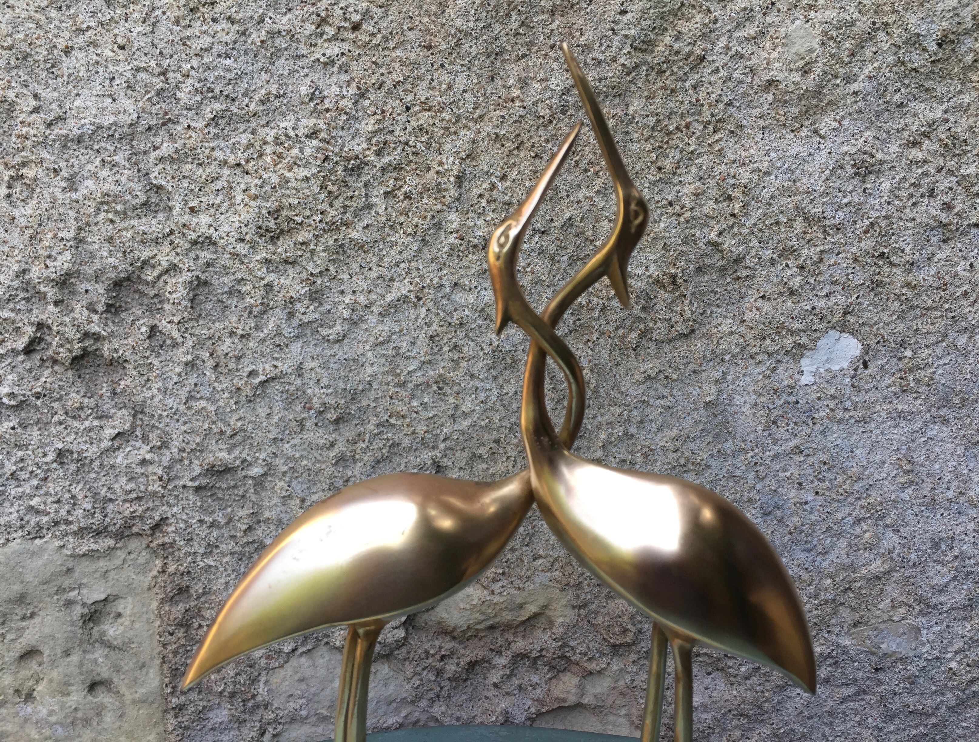 Couple of vintage brass herons