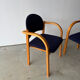 Set of two stackable beech chairs in curved Scandinavian style from IKEA.