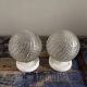 Set of two chiseled glass globe wall lights