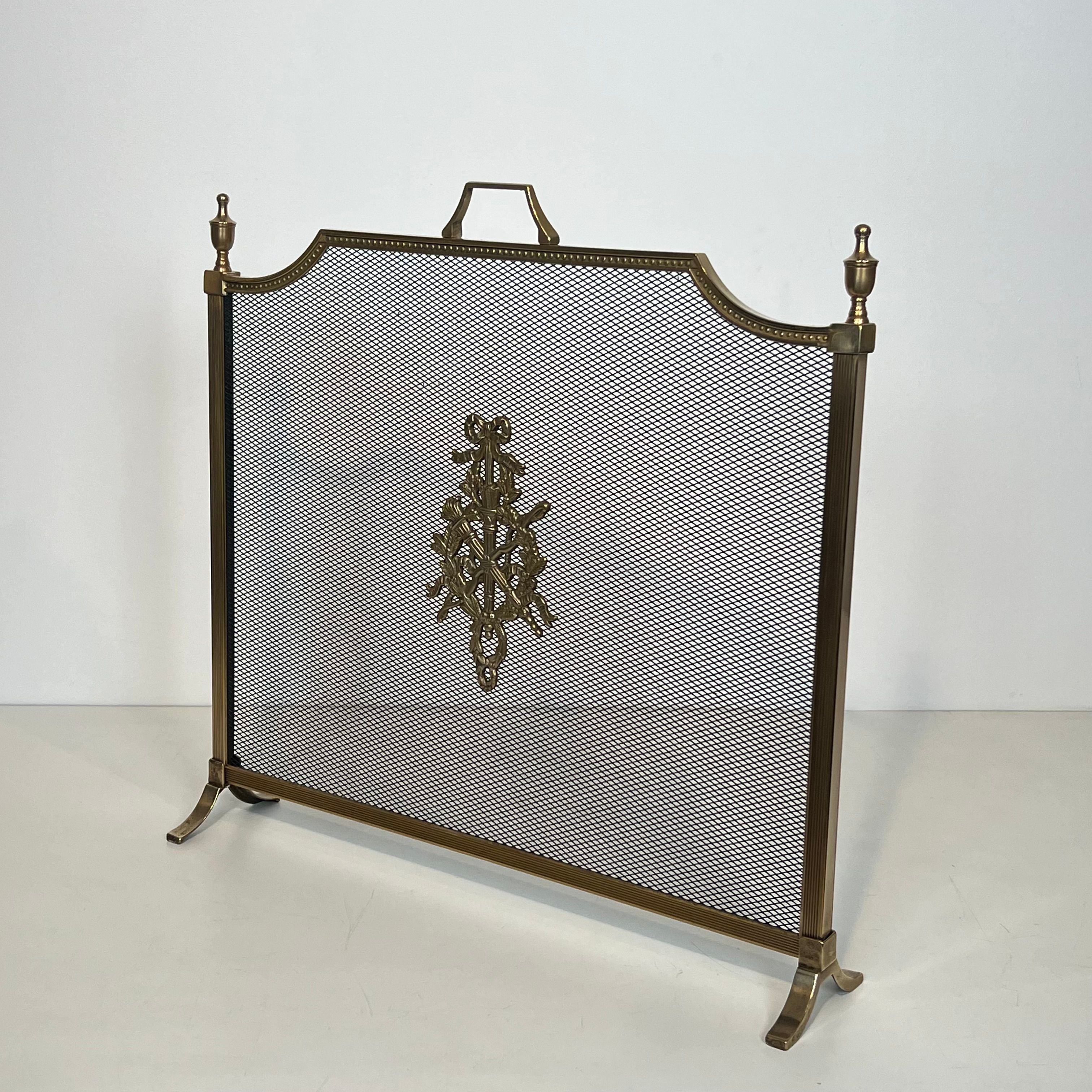 Brass fire screen and grille in the Louis XVI style in the taste of Maison Jansen.