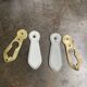 pair of antique brass door lock entries and porcelain cover art d