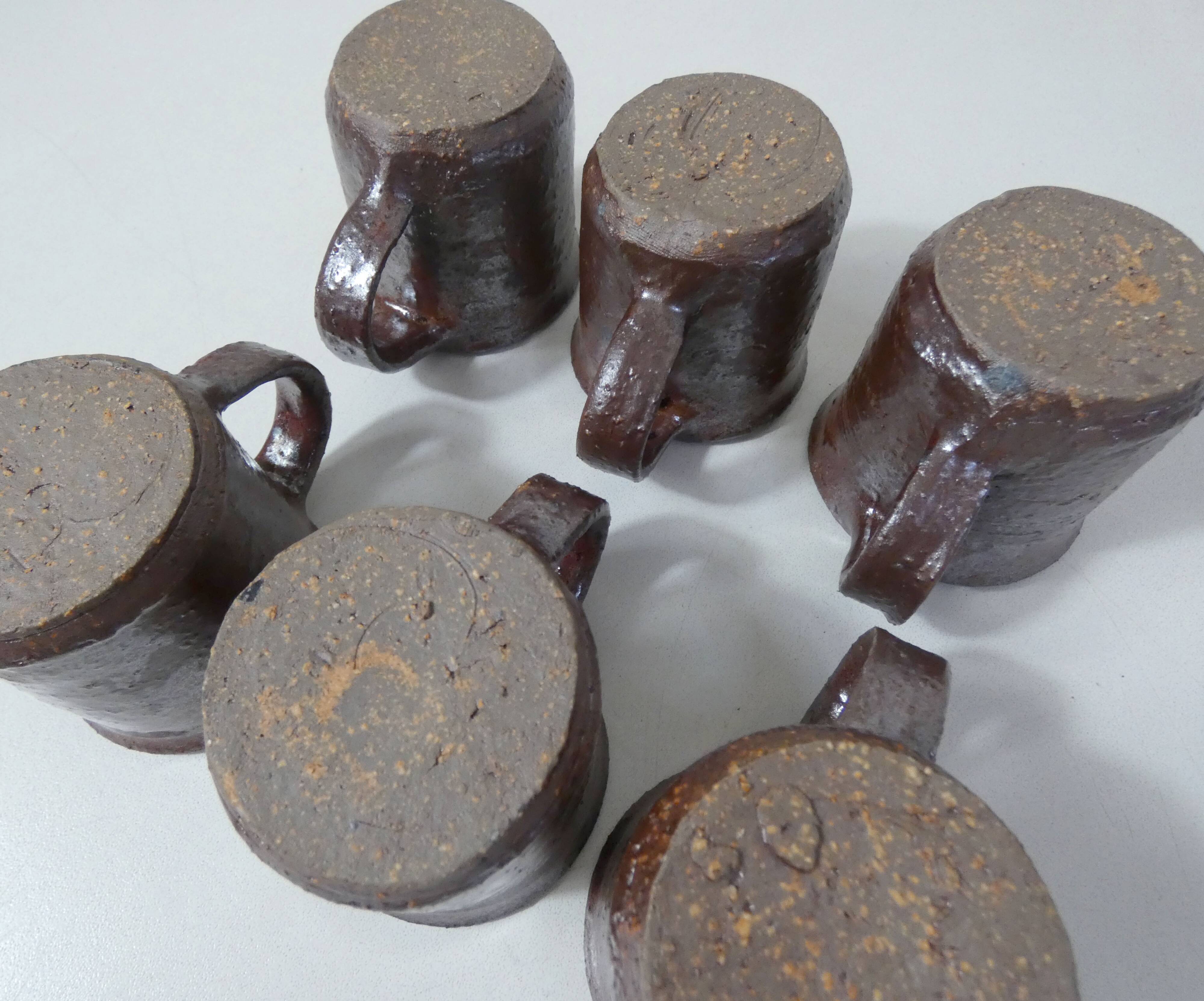 coffee service in iridescent stoneware cups and vintage sugar bowl