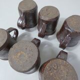 coffee service in iridescent stoneware cups and vintage sugar bowl
