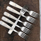 6 silver forks with flower pattern