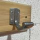 Vintage wall coat rack from the 1960s.