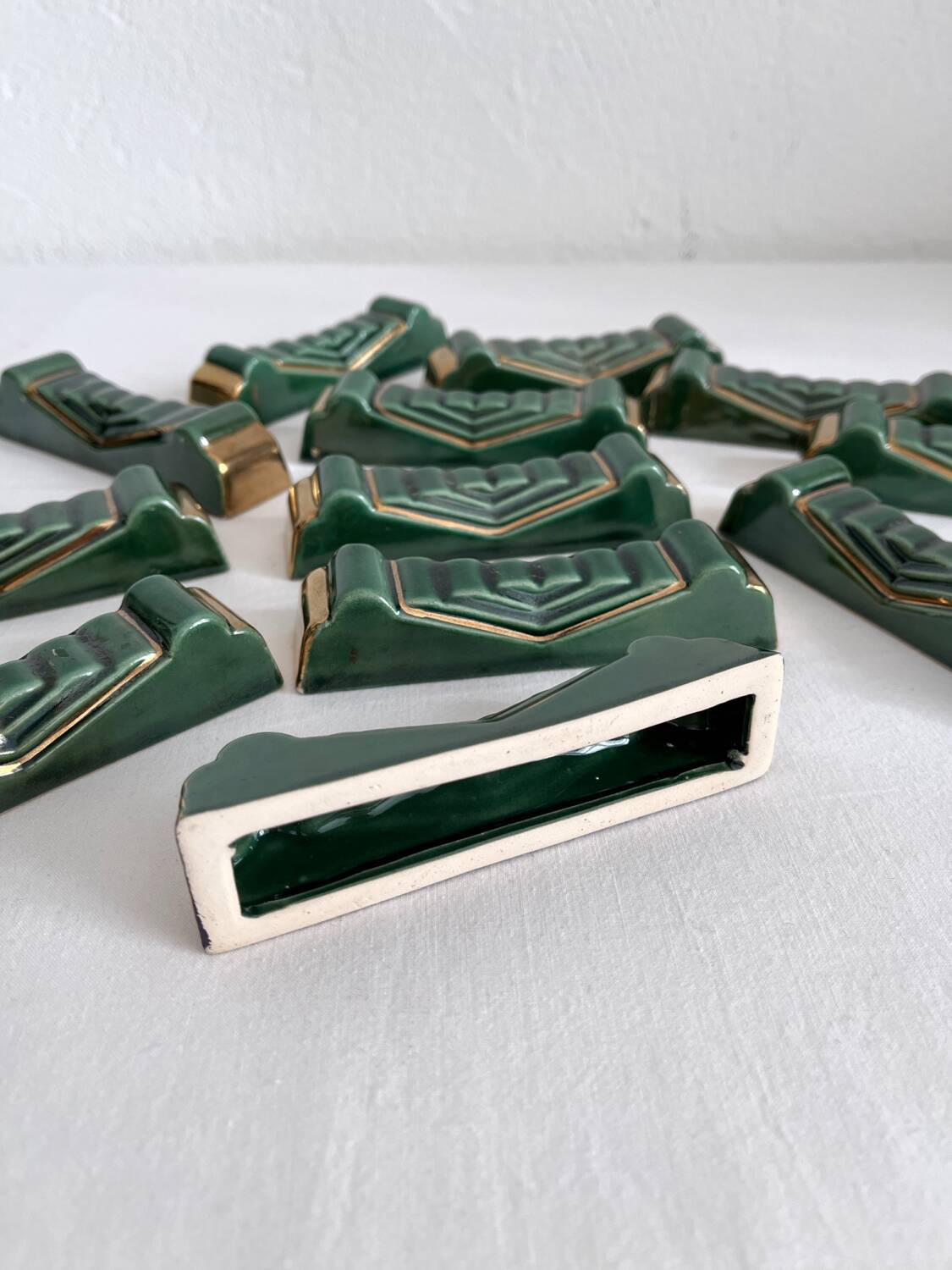 12 vintage green and gold ceramic knife holders from the 50s