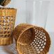 Four long drink glasses in vintage woven rattan cases