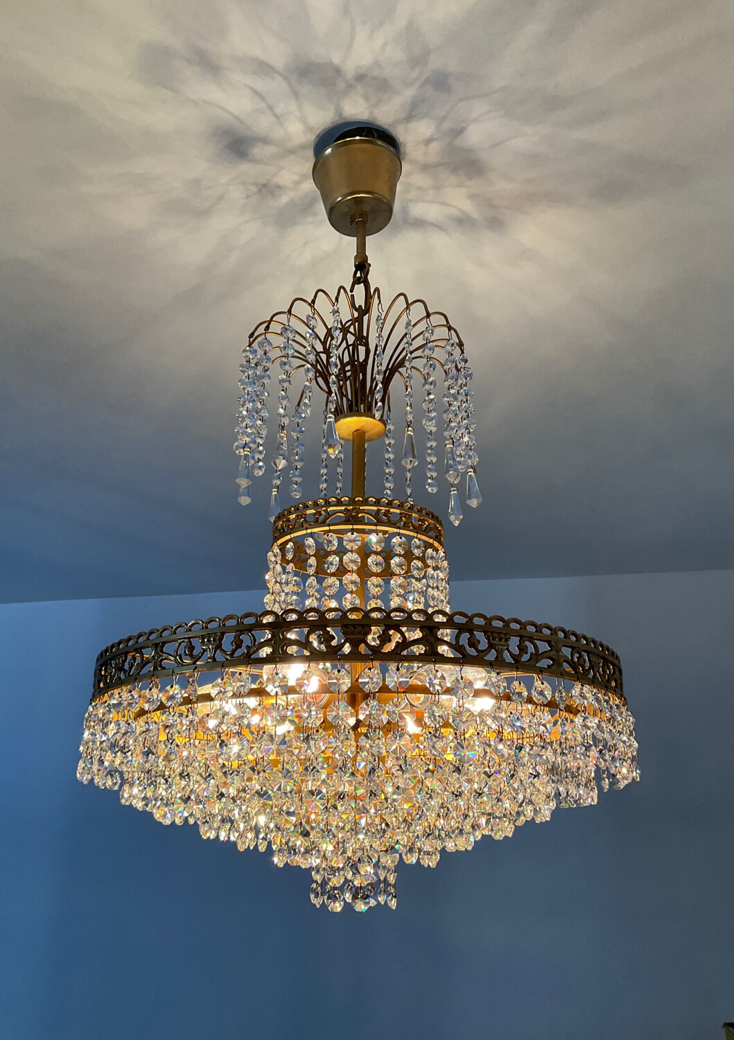 Cascade chandelier with crystal and bronze tassels