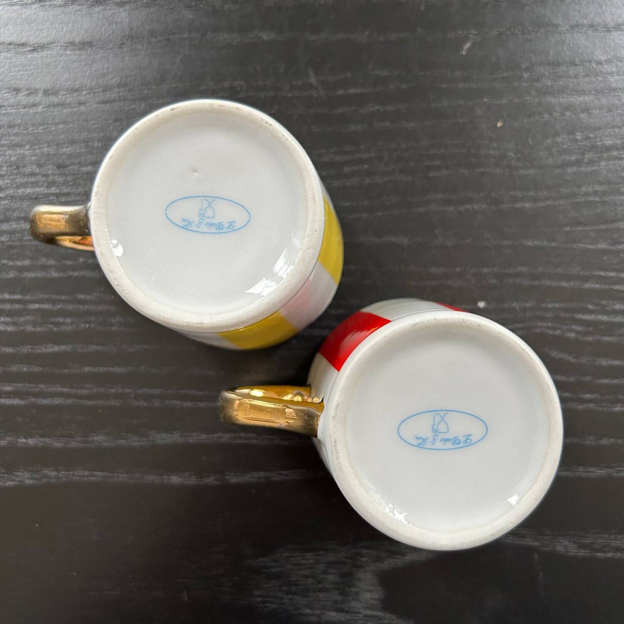 Pair of red and yellow striped cups
