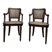 Paire de fauteuils cannés de style Louis XVI