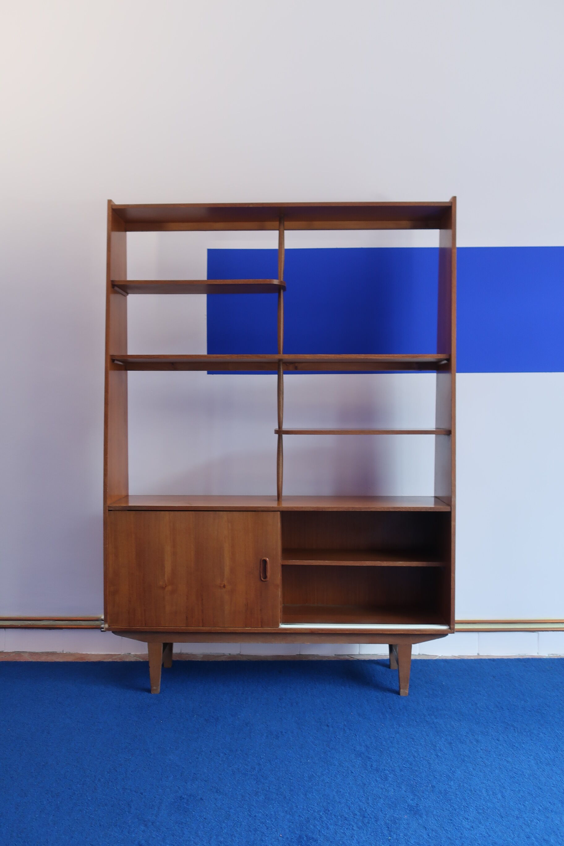 Library separator of 60s teak pieces