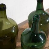Antique green demijohns (c.1920). Set of 3 pieces