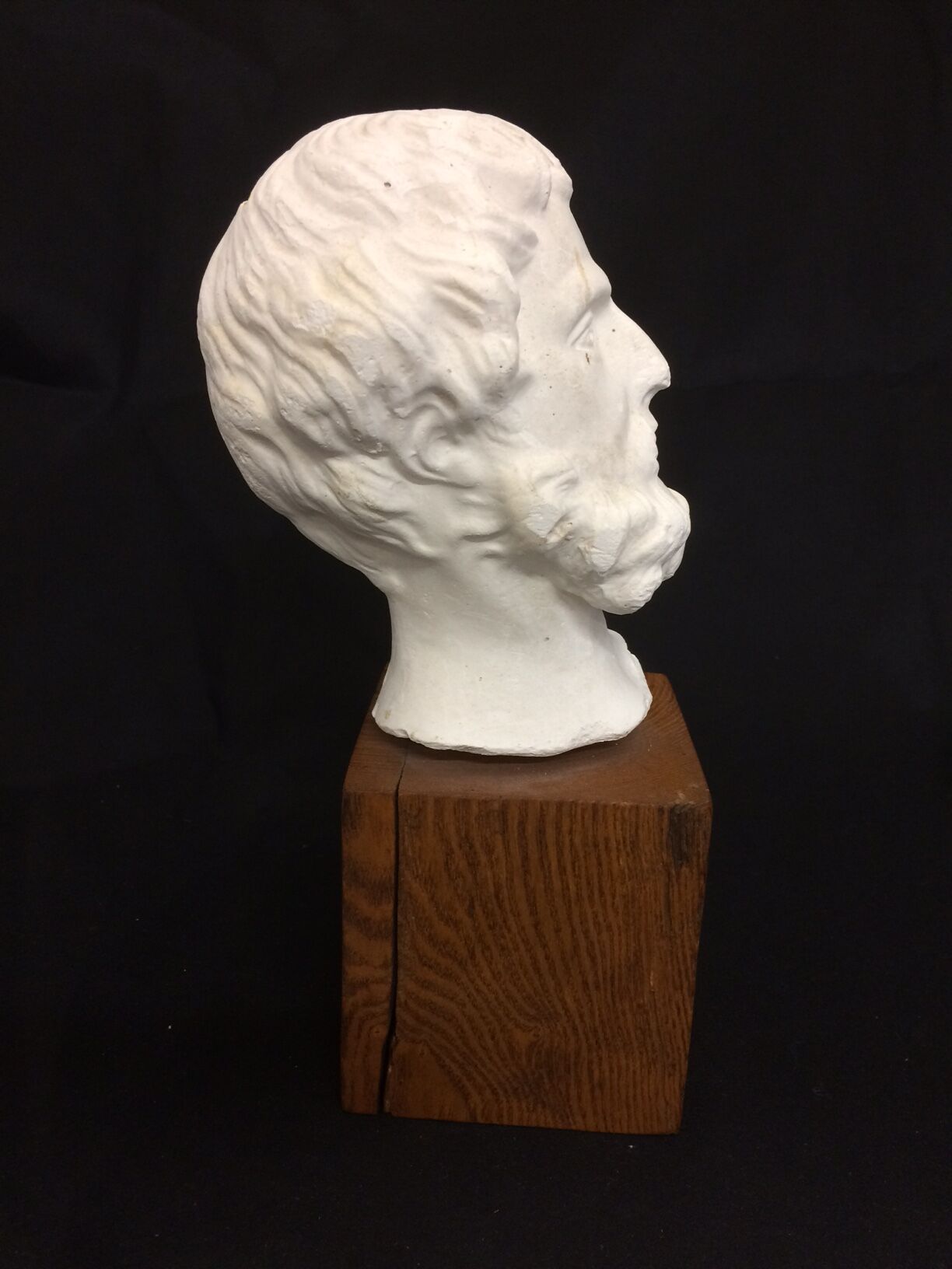 Decorative head in plaster